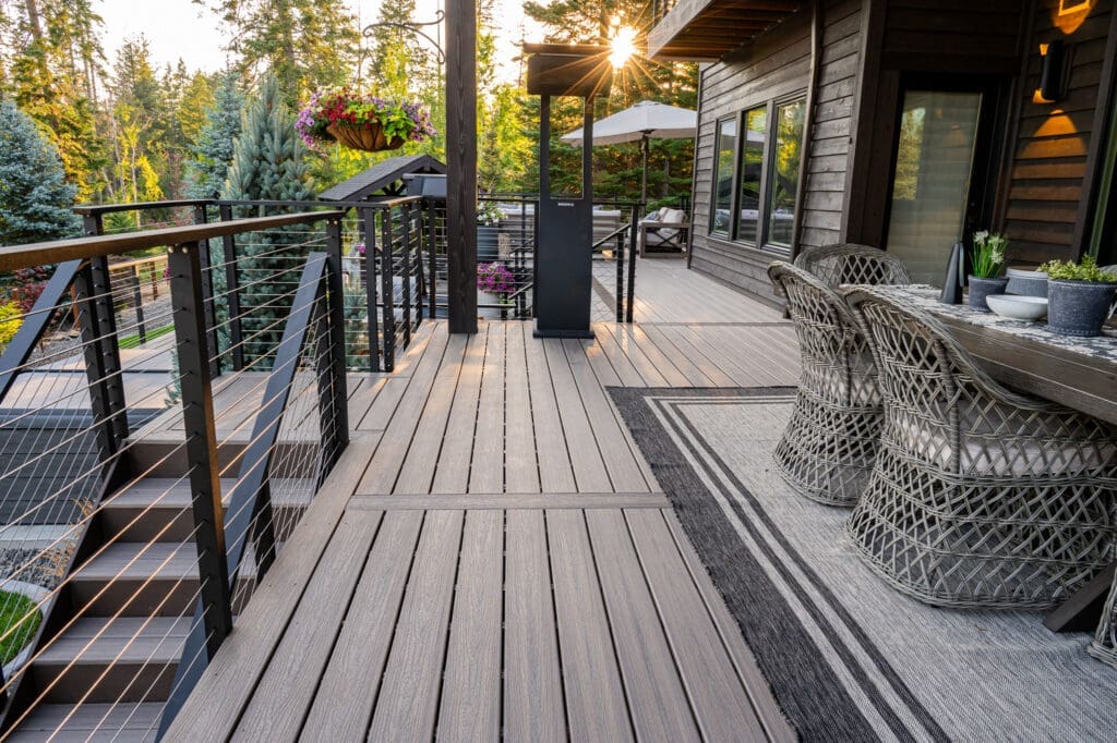 wicker deck chairs surrounded by nature