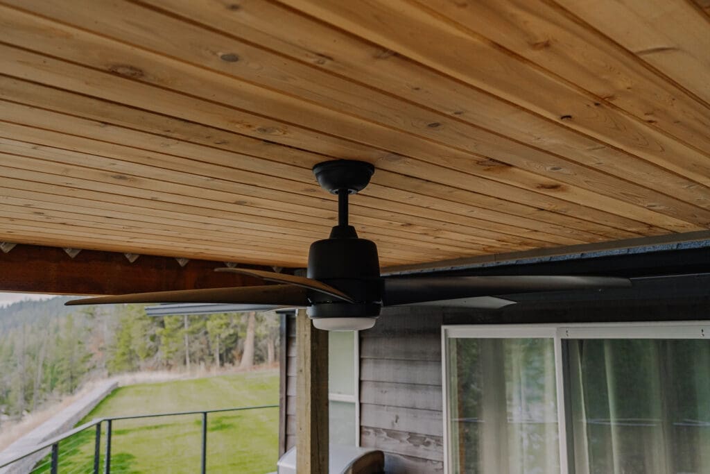 Ceiling fan under cedar outdoor soffit