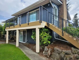Modern house with elevated deck and stairs