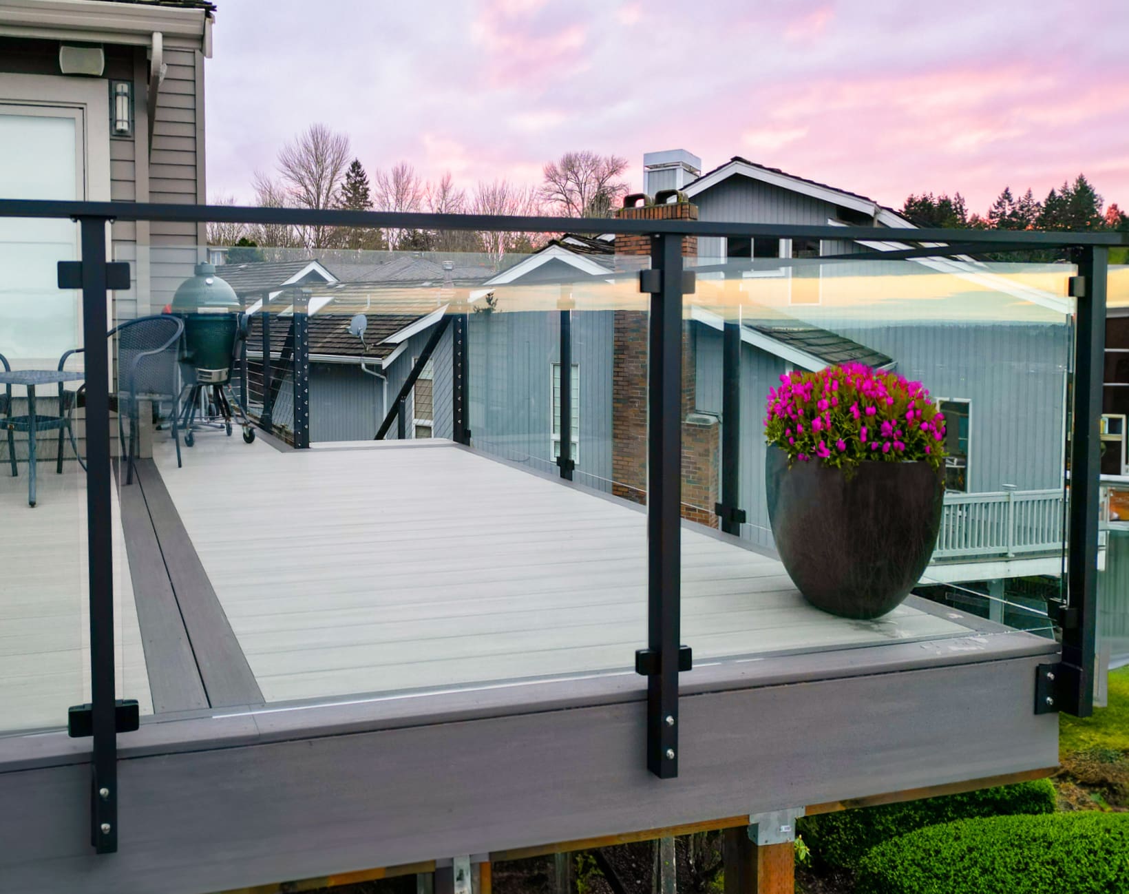 Rooftop deck with framed glass railing