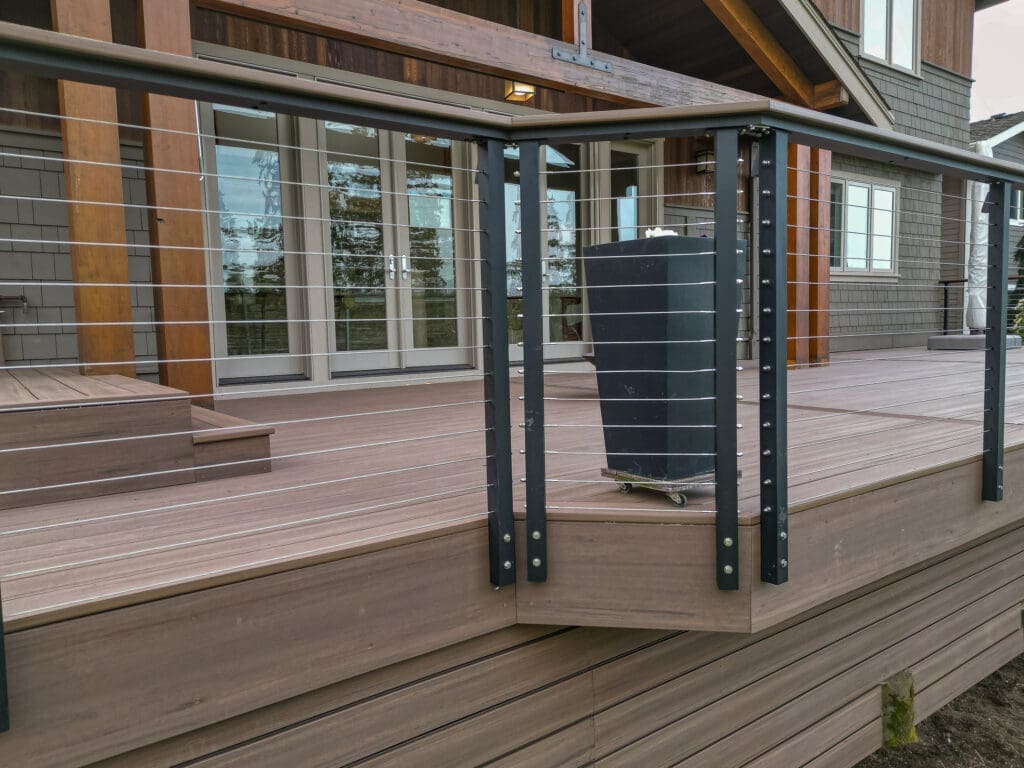 Modern deck with cable railing and planter box.