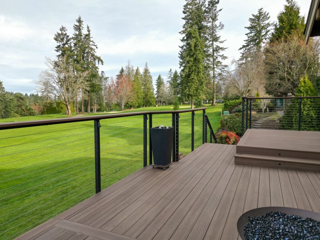 Spacious deck with scenic golf course view.