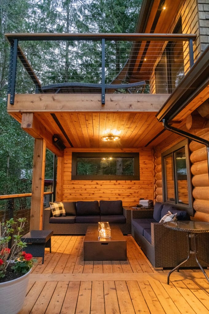 Cozy outdoor patio with wooden decor and seating