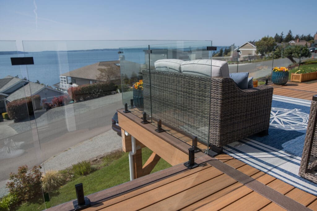 Ocean view from deck with seating area.