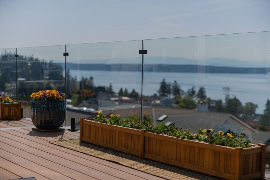Terrace with planters overlooking lake and mountains