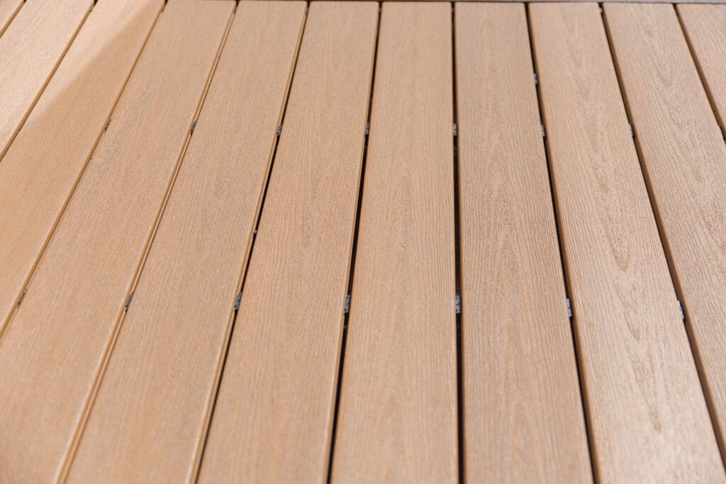 Close-up of wooden deck surface with parallel planks.