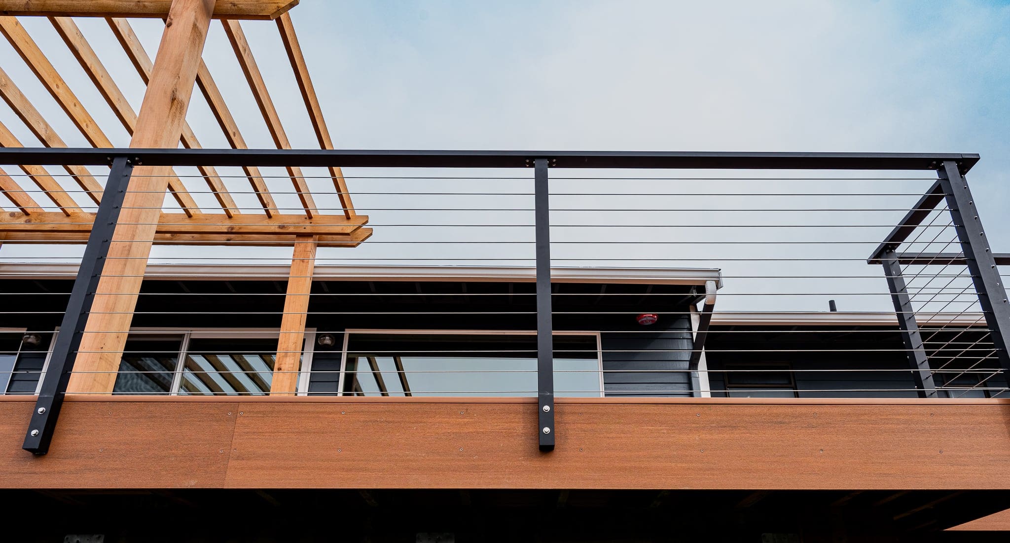 Modern wooden and metal balcony design