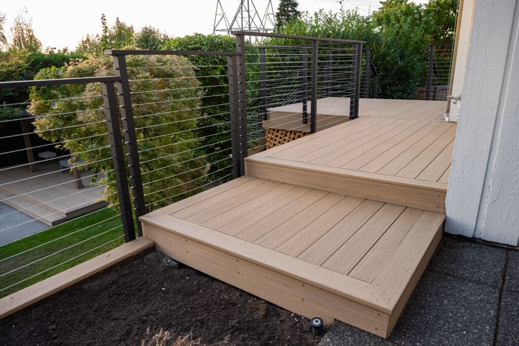 Modern wooden deck with cable railing