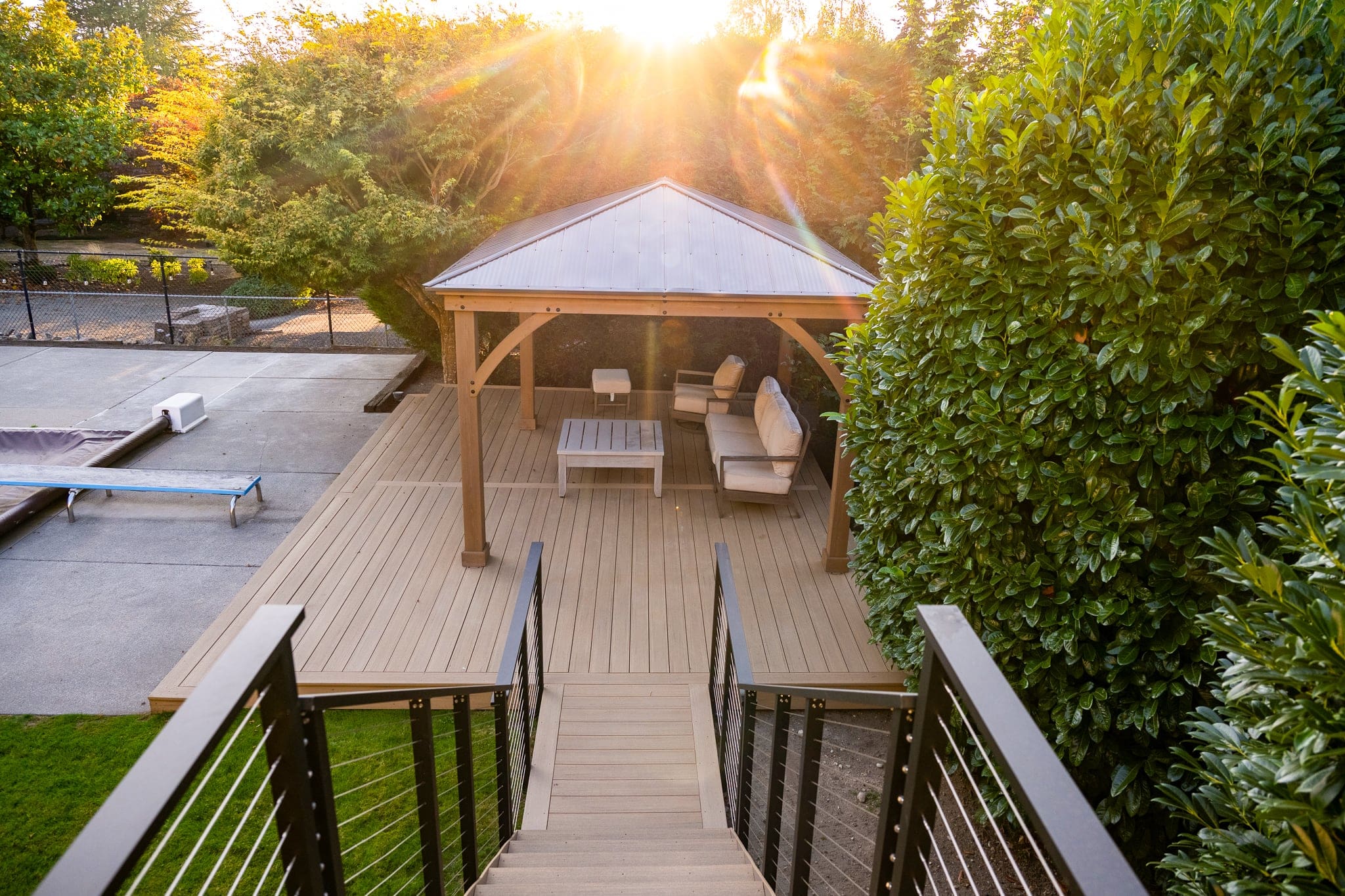 composite patio with gazebo and outdoor furniture