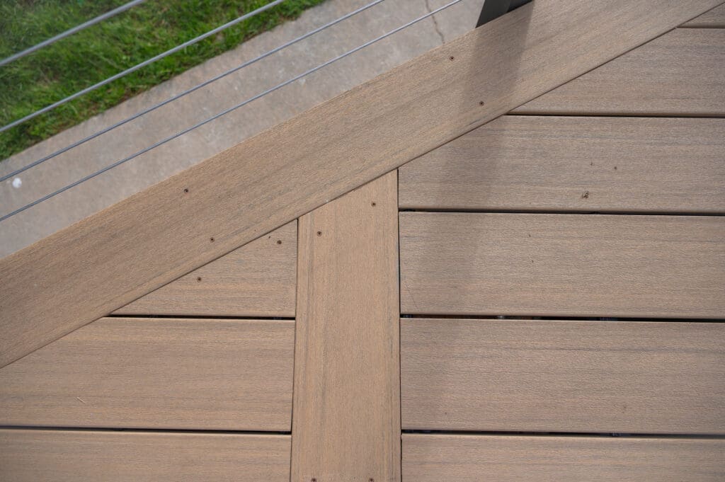 Close-up of wooden deck railing detail