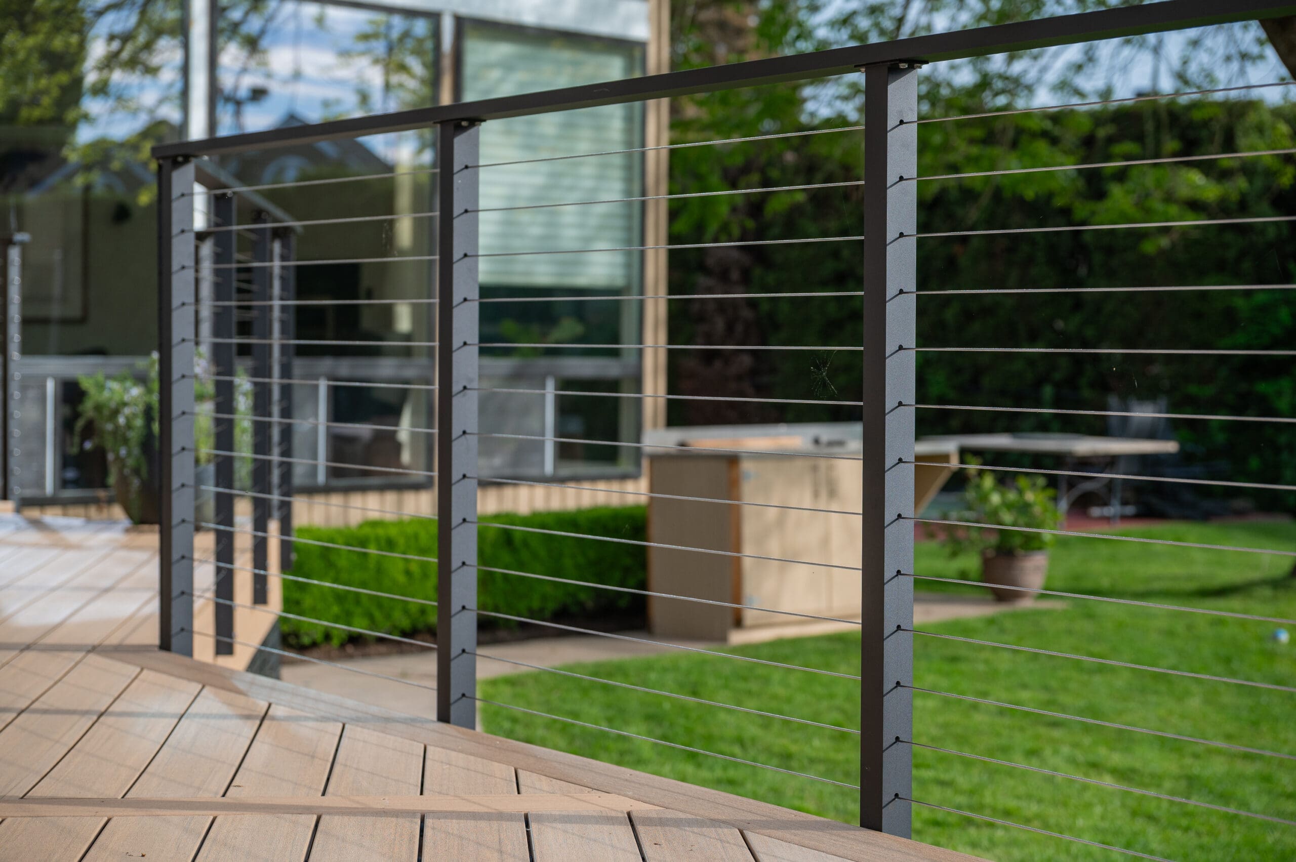 Modern deck with metal cable railing