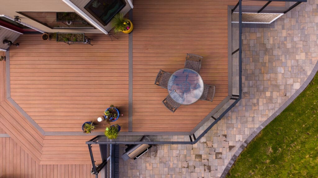 Overhead view of wooden deck with patio furniture
