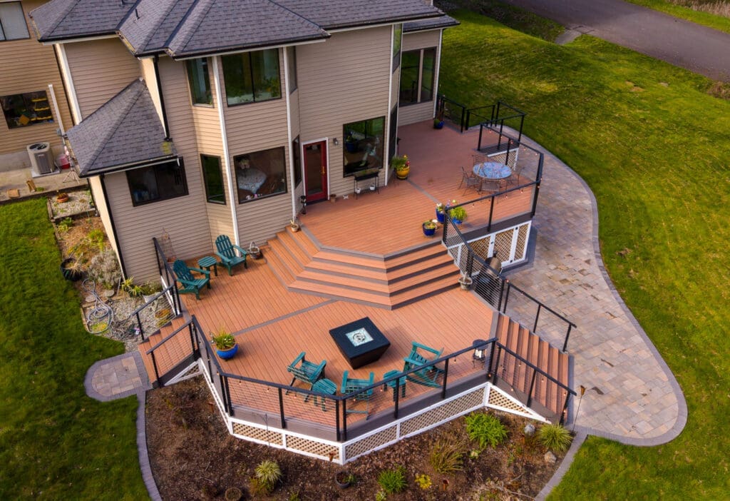 Multi-level backyard deck with patio furniture