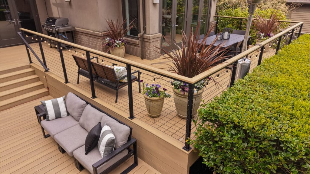 Modern multi-level deck with seating and string lights