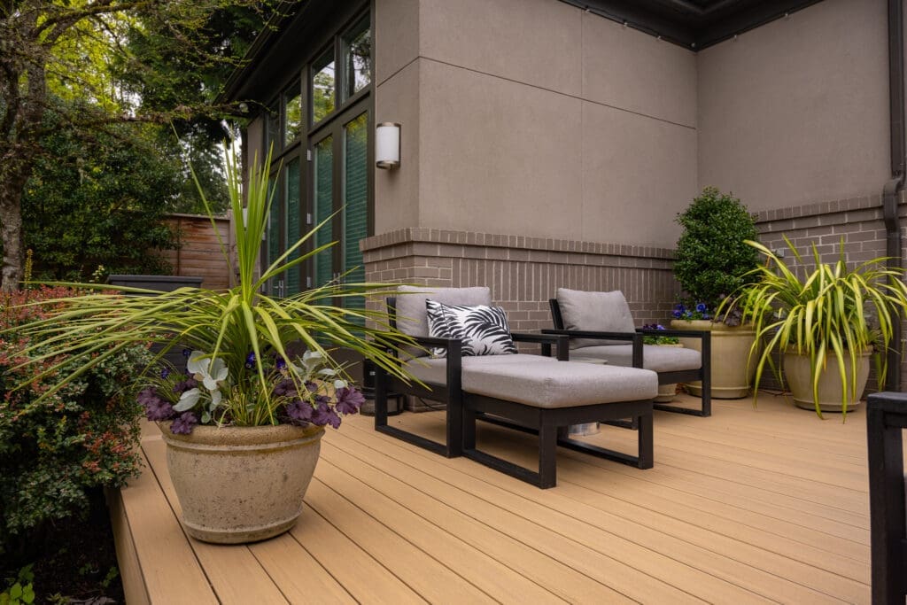 Modern patio with chairs and potted plants