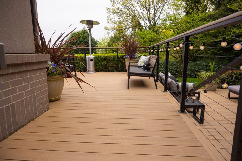 Modern backyard deck with seating and string lights