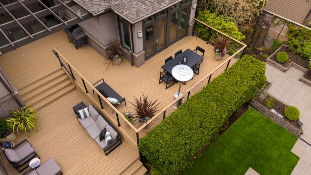 Modern backyard deck with outdoor dining and seating