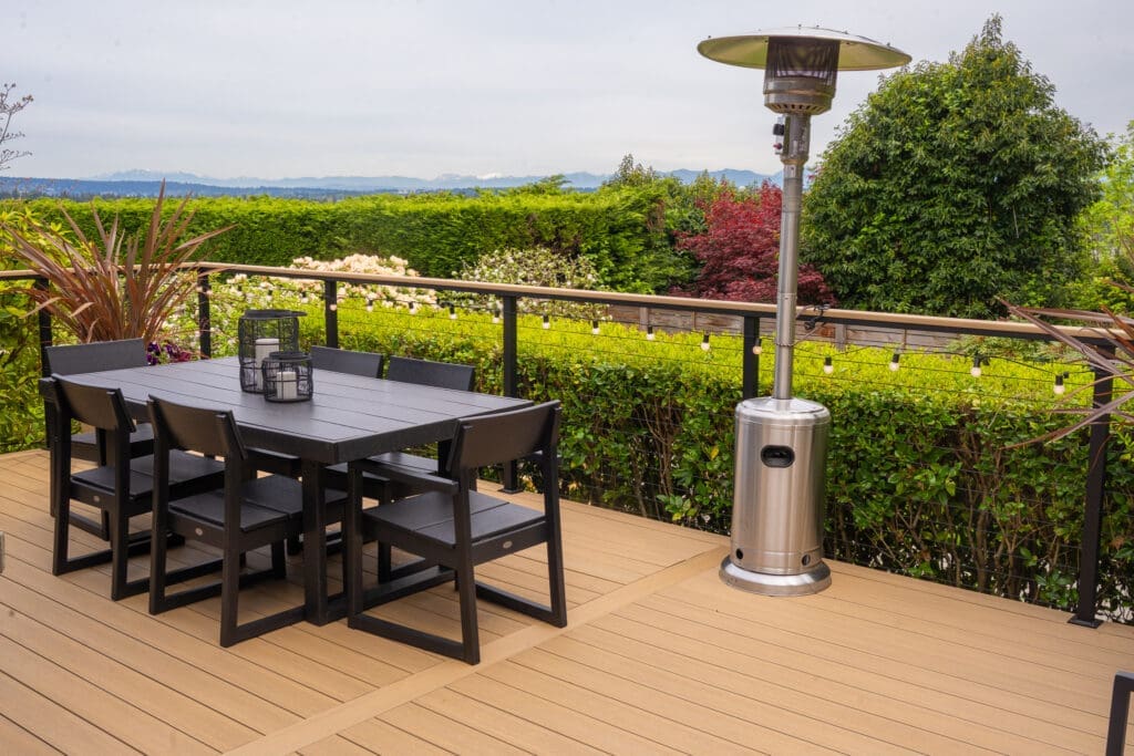 Outdoor deck with dining set and patio heater